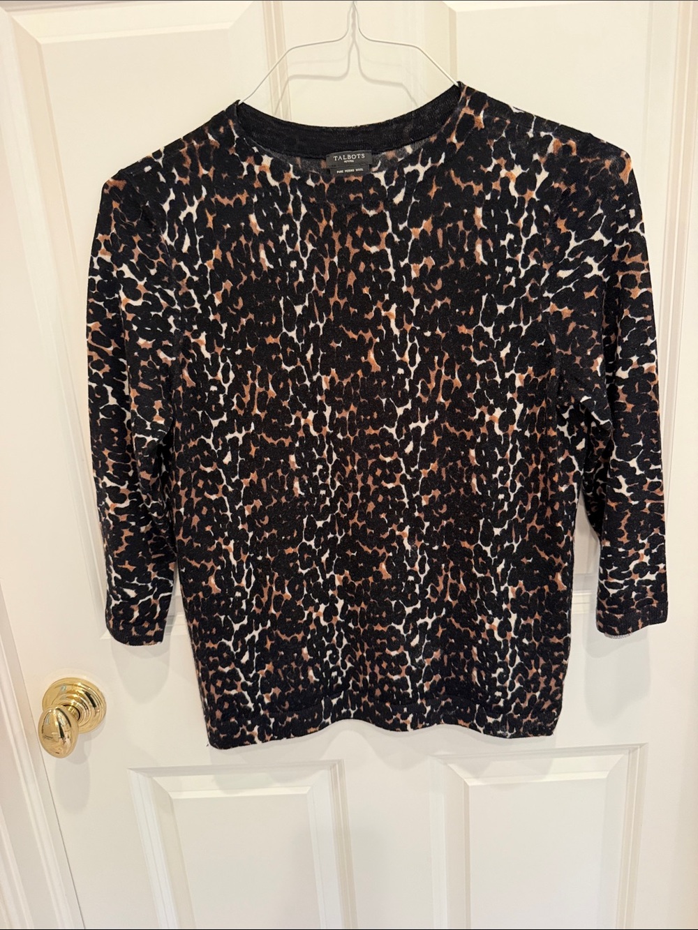 Women’s merino wool sweater.